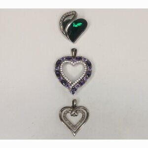 THREE SHINY HEART PENDANTS FREE WITH PURCHASE